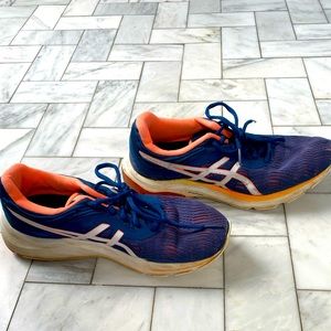 These athletic shoes are comfortable, well worn, and amazing for any activity.